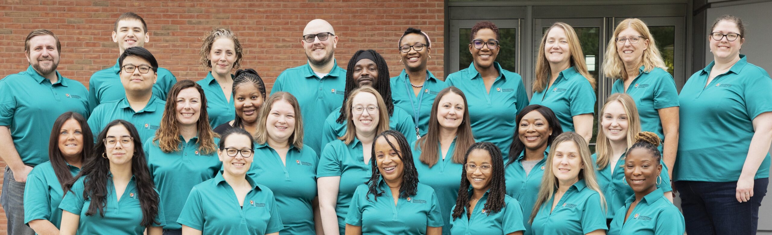 Human Resources & Strategic Talent Management team group photo from July 2025.Photo by Melissa Penley Cormier of Research Graphics at UMBC.